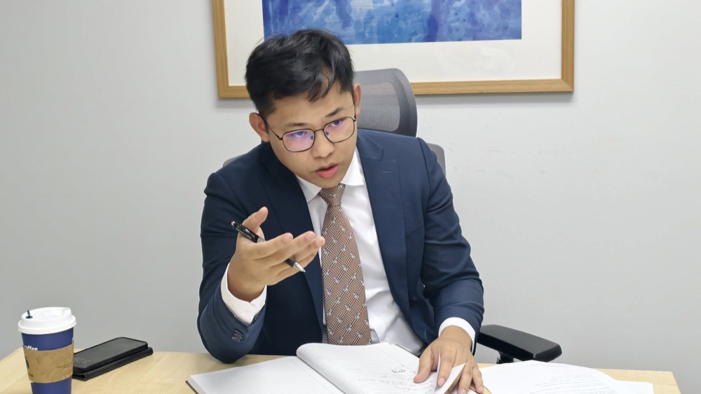 Dylan Chong at work in the firm